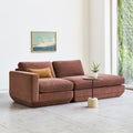Gus* Modern Podium 2PC Lounge, modular chaise sofa, Regency Beet rust with a round side table in a bright room