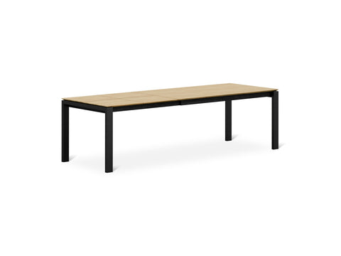 Gus* Modern Revell Extendable Dining Table, extendable dining table, Royal Oak fully extended, three-quarter view on white