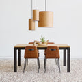 Gus* Modern Revell Extendable Dining Table, oak dining table, Royal Oak with leather dining chairs under three wood veneer pendants