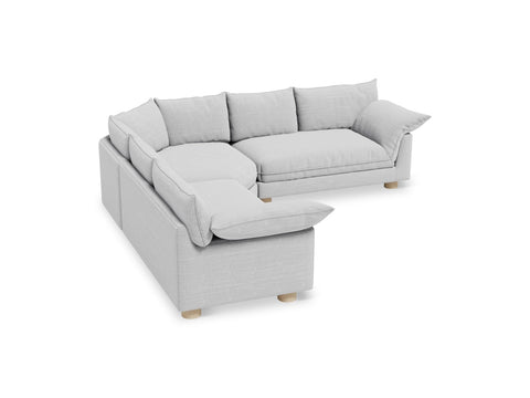 Gus* Modern Zoe Bi-Sectional, upholstered corner sectional sofa, Rosslyn Argent light grey fabric, three-quarter view on white