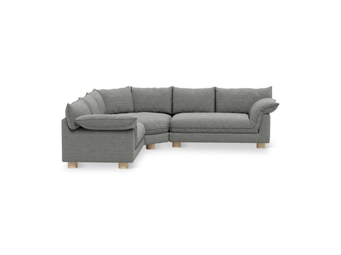 Gus* Modern Zoe Bi-Sectional, upholstered corner sectional sofa, Rosslyn Legacy grey fabric, angled view on white