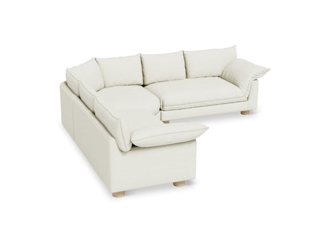 Gus* Modern Zoe Bi-Sectional, upholstered corner sectional sofa, Sutton Canvas cream fabric, three-quarter view on white