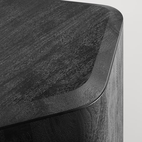Close-up of the black-stained acacia wood grain and beveled top edge on the Blu Dot Hoard Tall Side Table
