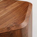 Close-up of the acacia wood grain and beveled top edge on the Blu Dot Hoard Tall Side Table