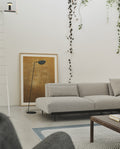 Muuto Leaf Floor Lamp in a modern living room with minimalist decor.