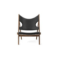 Knitting Lounge Chair by Audo Copenhagen in walnut frame with black leather seat.