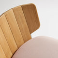 Low Fade Outdoor Lounge Chair by Blu Dot, curved FSC-certified teak backrest and Sunbrella Blush cushion detail