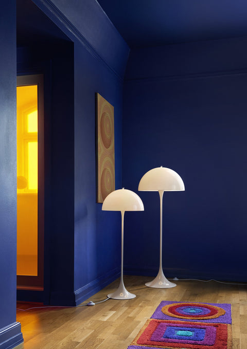 Louis Poulsen Panthella 400 Floor Lamp, white opal acrylic floor lamp beside the Panthella Floor Lamp in a deep blue room