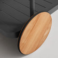 Longday Bar Cart by Blu Dot, solid teak wheel with carbon powder-coated aluminum frame, close-up