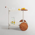Longday Bar Cart by Blu Dot in white powder-coated aluminum with solid teak wheels, 3/4 front view