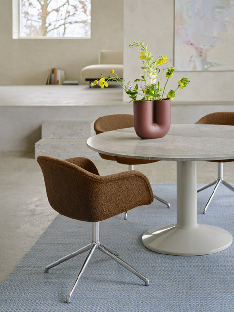 Muuto Midst Table with round marble top styled with modern vase and dining chairs – Scandinavian interior