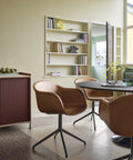 cognac leather swivel dining chair by muuto in scandinavian dining room 