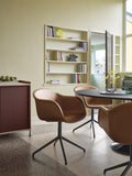 cognac leather swivel dining chair by muuto in scandinavian dining room 