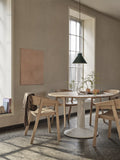 cover armchair and midst scandinavian dining table by muuto lifestyle image