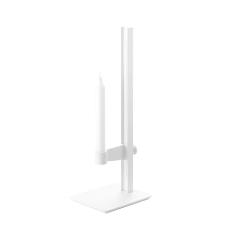 White Museum Candle Holder product image with white taper candle on white background.