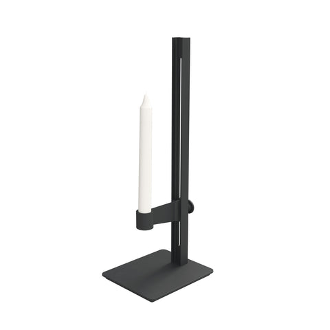 Black Museum Candle Holder product image with white taper candle on white background.