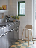 scandinavian kitchen with muuto nerd counter stool in oak 