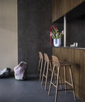 scandinavian bar inspiration with nerd bar stools in dark stained brown