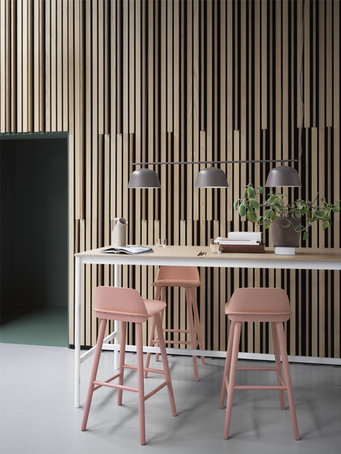 scandinavian dining room with nerd counter stools by muuto in tan rose 