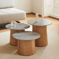 marble and wood coffee table in a cluster by Fredericia Furniture