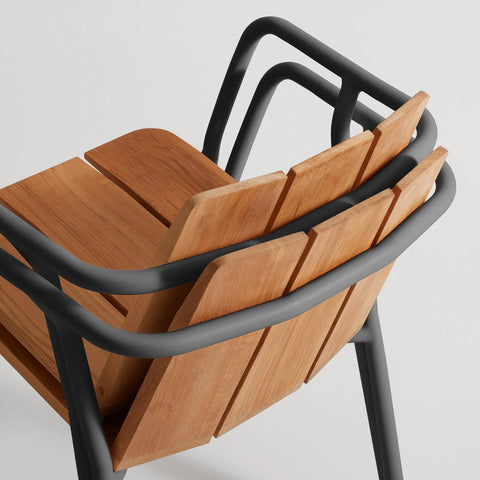 Offline Outdoor Chair by Blu Dot, stacked teak seat and carbon aluminum frame detail