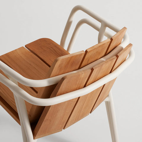 Offline Outdoor Chair by Blu Dot, stacked teak seat and white aluminum frame detail