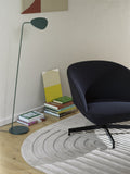 muuto oslo lounge chair lifestyle image with scandinavian lamp