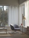 Pull Floor Lamp by Muuto with adjustable height and minimalist design for modern interiors.