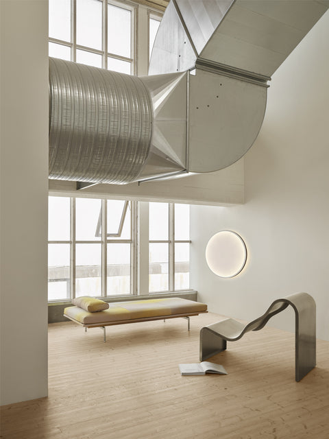 Muuto Dream View Bench in brushed steel styled with Outline Daybed and Calm Wall Lamp in modern interior