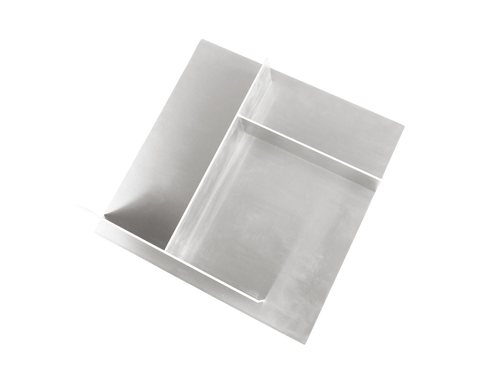 Frama Rivet Typecase in Aluminum, the box tilted in the air so the compartments and the inside corners are visible
