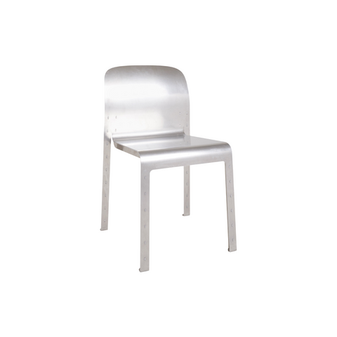Frama Rivet Chair in Aluminum, metal chair with a curved back shell and slim square legs, three quarter view on white