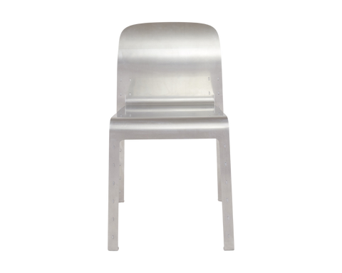 Frama Rivet Chair in Aluminum, brushed metal chair seen square from the front, rounded back shell above a flat seat