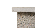 Frama T-Table in Terrazzo, close up of the slab top meeting the leg, showing the coarse aggregate in the terrazzo
