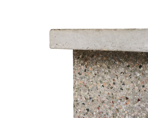 Frama T-Table in Terrazzo, close up of the slab top meeting the leg, showing the coarse aggregate in the terrazzo