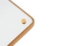 Frama RM-1 Rectangular Mirror, close up of a rounded corner where the oak edge meets the glass with a brass screw head