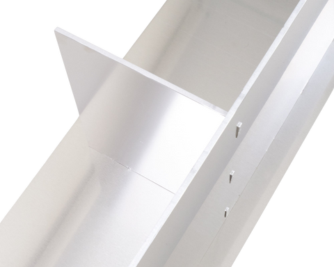Frama Rivet Shelf, close view of the folded metal shelf at an angle, upturned back lip and a vertical row of rivets