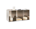 Frama Rivet Case in Aluminum, angled view of the case with candles, a bowl, books and stacked plates filling its bays