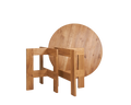 Frama Farmhouse Trestle Table in Natural Oak, round top standing on edge behind two open trestles with the parts not yet joined