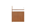 Frama Shelf Library Medium Cabinet Add-on Section in Natural Oak, one upright with a single oak shelf above a two door cabinet, on white
