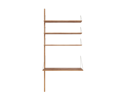 Frama Shelf Library Add-on Desk Section in Natural Oak, tall oak unit with three narrow shelves above a deeper desk shelf, front view on white