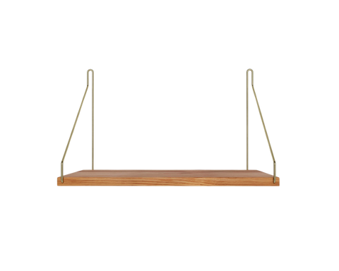 Frama Single Shelf, Natural Oak in Brass, short deep oak board on brass brackets, front view against a pale background