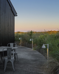 outdoor bollard lamp around a deck 