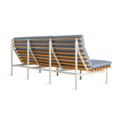Perch Outdoor 3 Seat Sofa by Blu Dot in Sunbrella Haze with White frame, rear 3/4 view showing FSC-certified teak slats