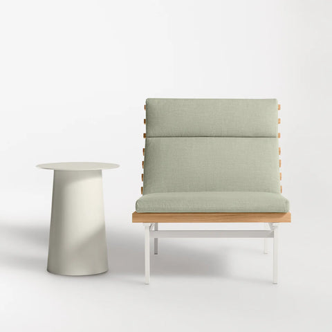 Perch Outdoor Lounge Chair by Blu Dot in Sunbrella Oasis with white aluminum frame and teak slats, styled with Circula Tall Side Table in Putty