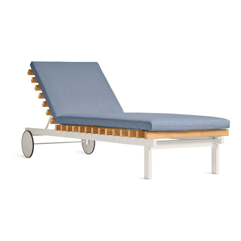 Perch Outdoor Sun Lounger by Blu Dot in Sunbrella Oasis with white aluminum frame, three-quarter view