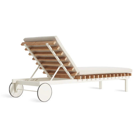 Perch Outdoor Sun Lounger by Blu Dot in Sunbrella Linen with white aluminum frame, rear three-quarter view with adjustable back raised