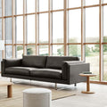 pon coffee table by fredericia with leather sofa in a scandinavian inspired living room