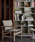 scandinavian living room with minimalist bookcase 