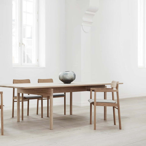 oak dining chairs and oak dining table designed by fredericia furniture 