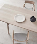 light oak oiled dining table and oak dining chairs designed by fredericia furniture